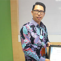Johan, S.Kom., M.M.